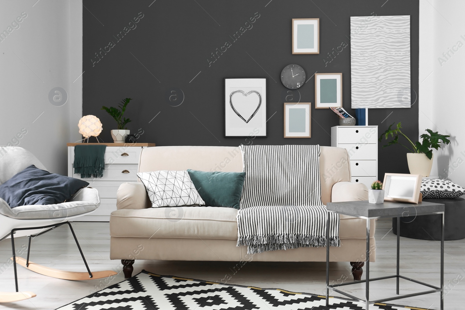 Photo of Cozy living room interior with comfortable sofa