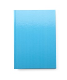 Photo of New light blue planner isolated on white, top view