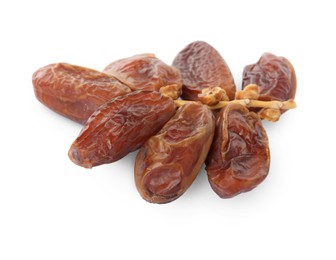 Sweet dates on branch against white background. Dried fruit as healthy snack