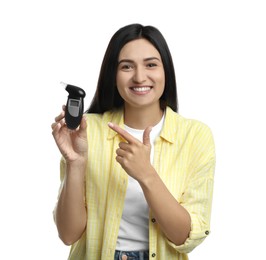 Photo of Happy woman with breathalyzer on white background