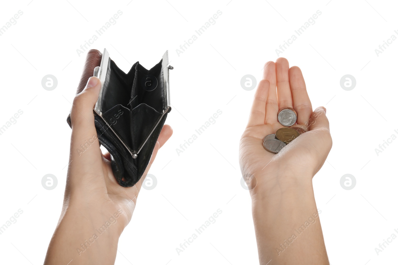 Photo of Poor woman holding empty wallet and coins on white background, closeup