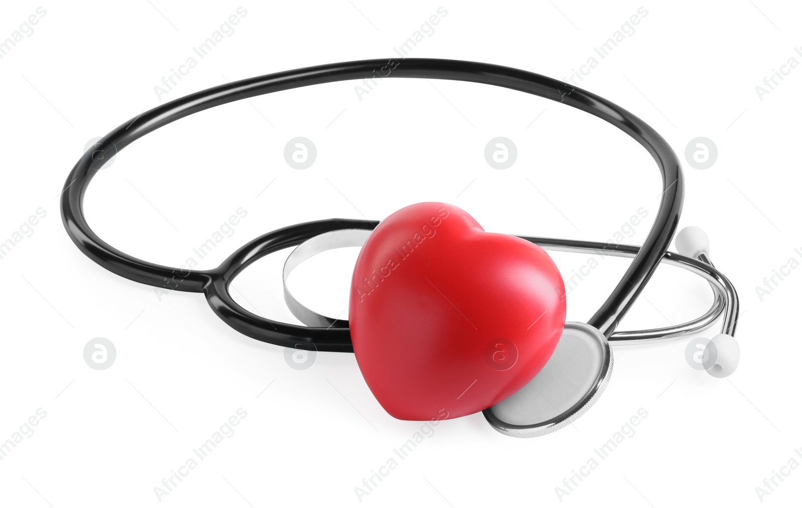 Photo of Stethoscope and red heart isolated on white