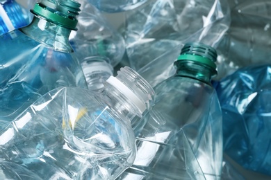 Photo of Many plastic bottles as background, closeup. Recycle concept