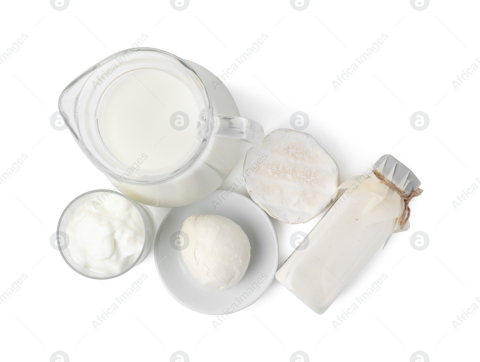 Photo of Different fresh dairy products isolated on white, top view