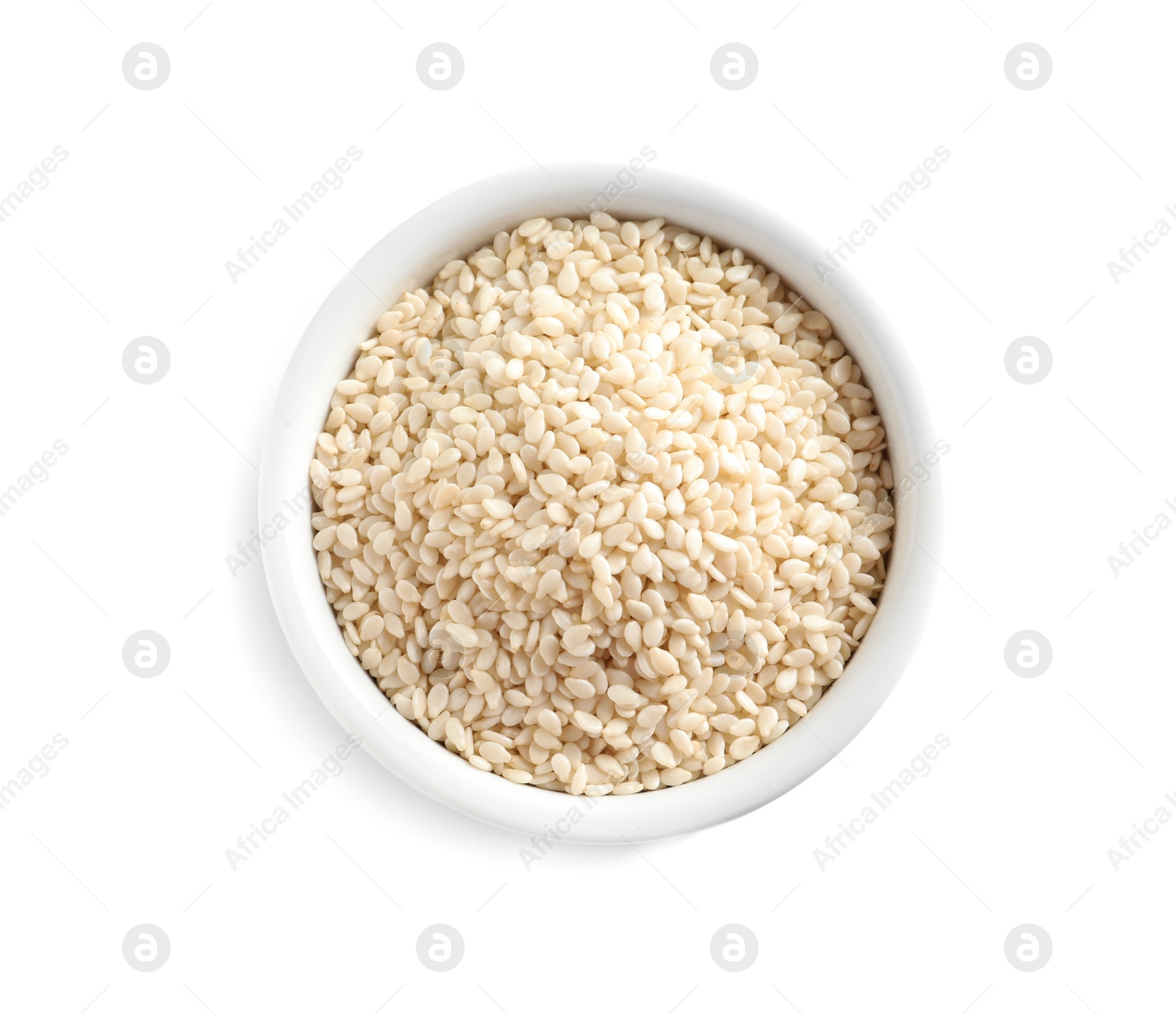 Photo of Sesame seeds in bowl on white background, top view. Delicious sauce condiment