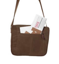 Photo of Brown postman bag with mails and newspaper on white background
