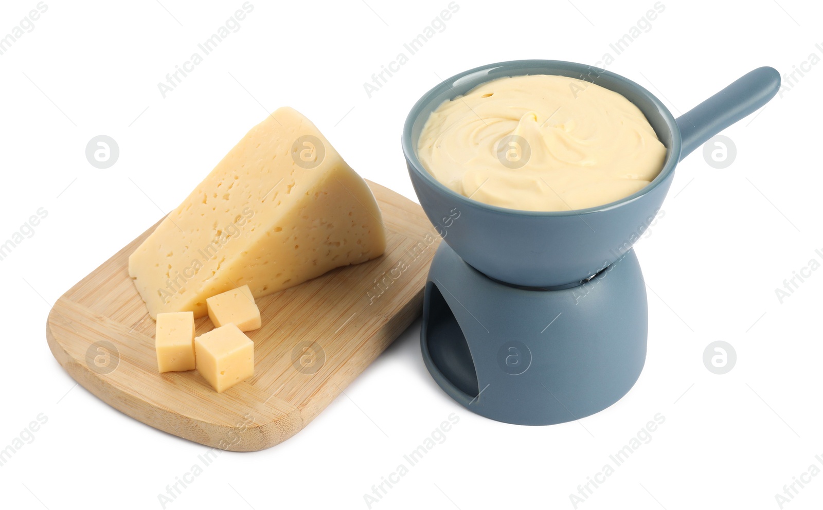 Photo of Fondue with tasty melted cheese and pieces isolated on white