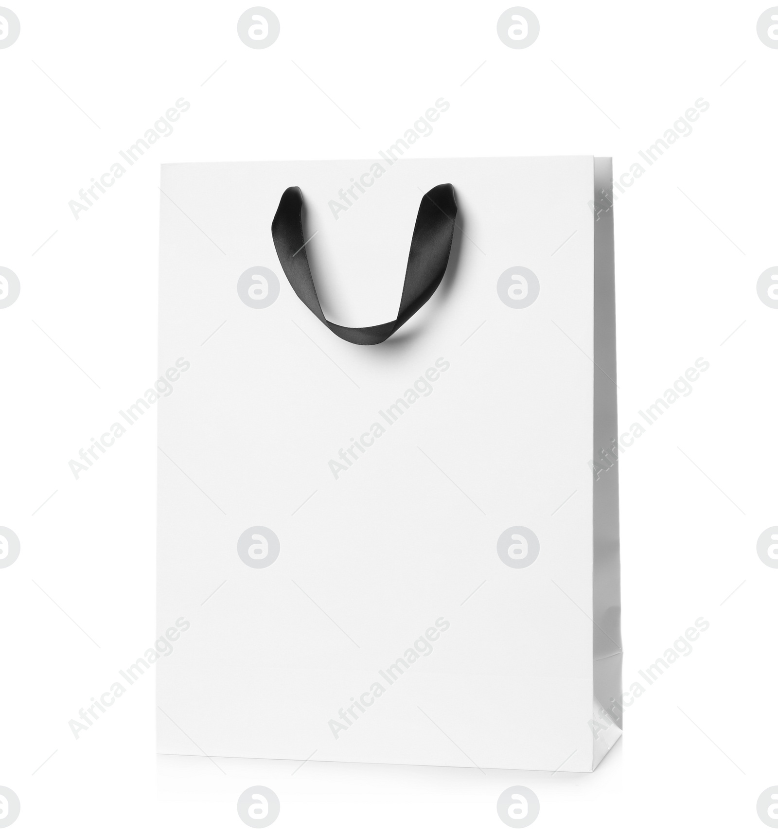 Photo of Paper shopping bag isolated on white. Mock up for design