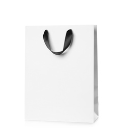 Photo of Paper shopping bag isolated on white. Mock up for design