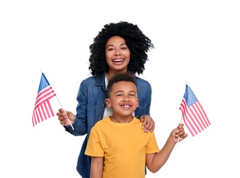 4th of July - Independence Day of USA. Happy woman and her son with American flags on white background
