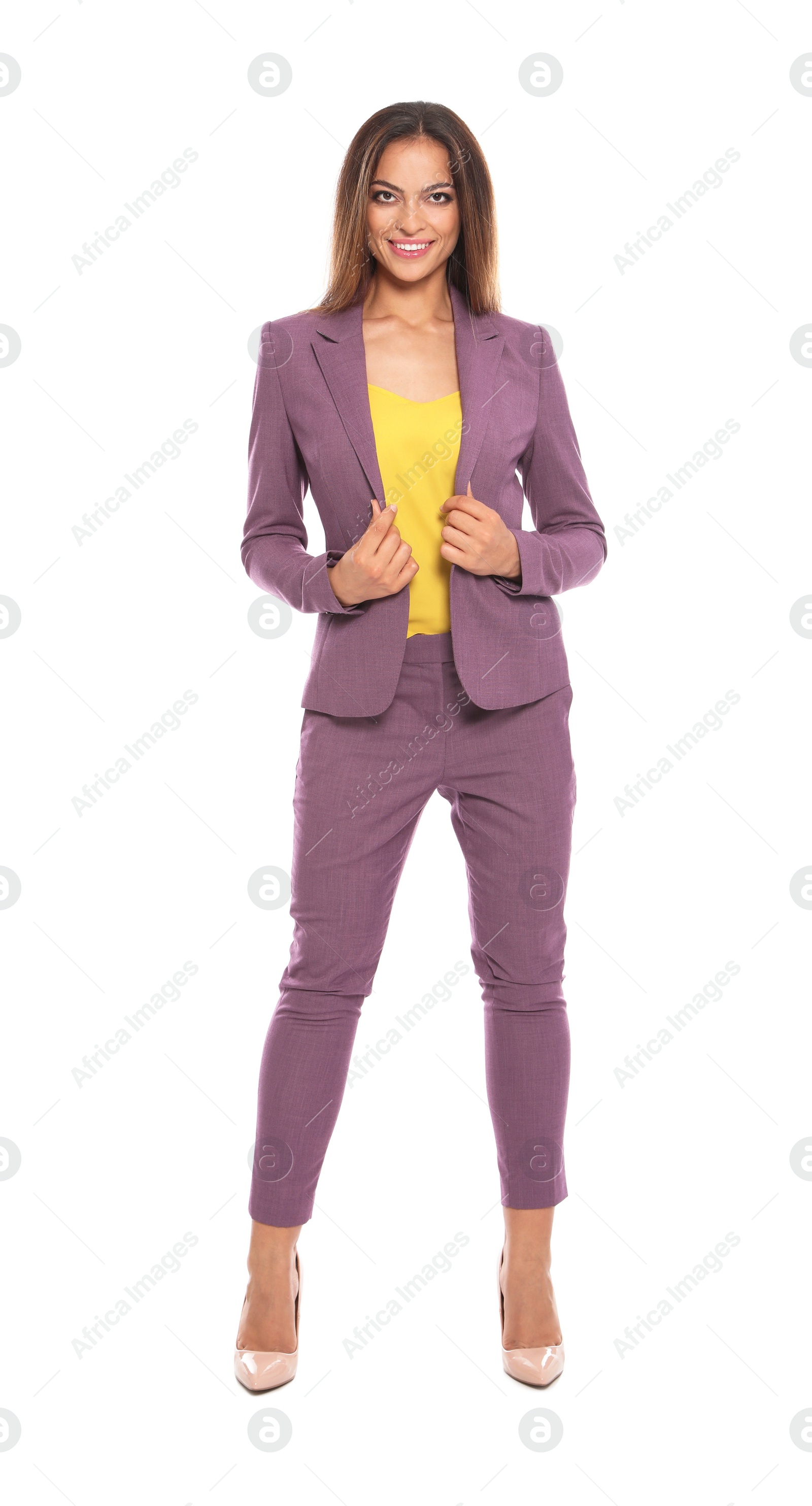 Photo of Full length portrait of beautiful young woman in business suit on white background