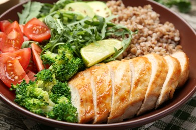 Healthy meal. Tasty products in bowl on table, closeup