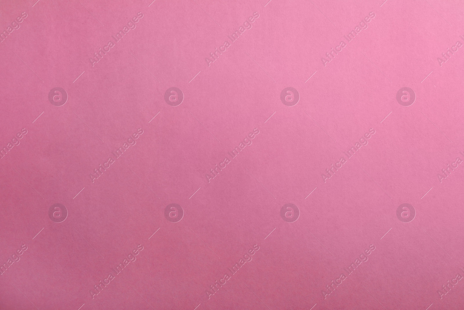 Photo of Abstract pink background, top view. Colorful paper