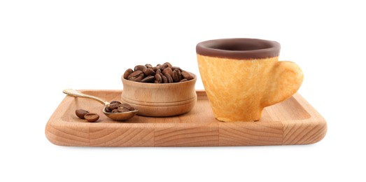 Photo of Wooden tray with edible espresso cookie cup and roasted beans isolated on white