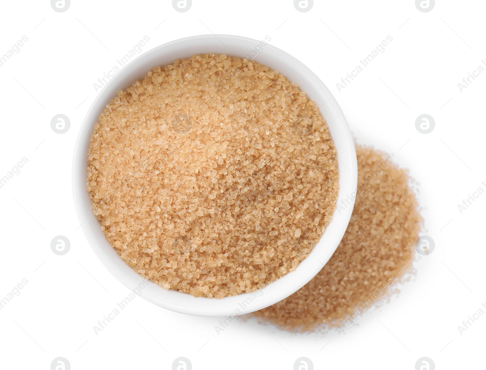 Photo of Brown sugar and bowl on white background, top view