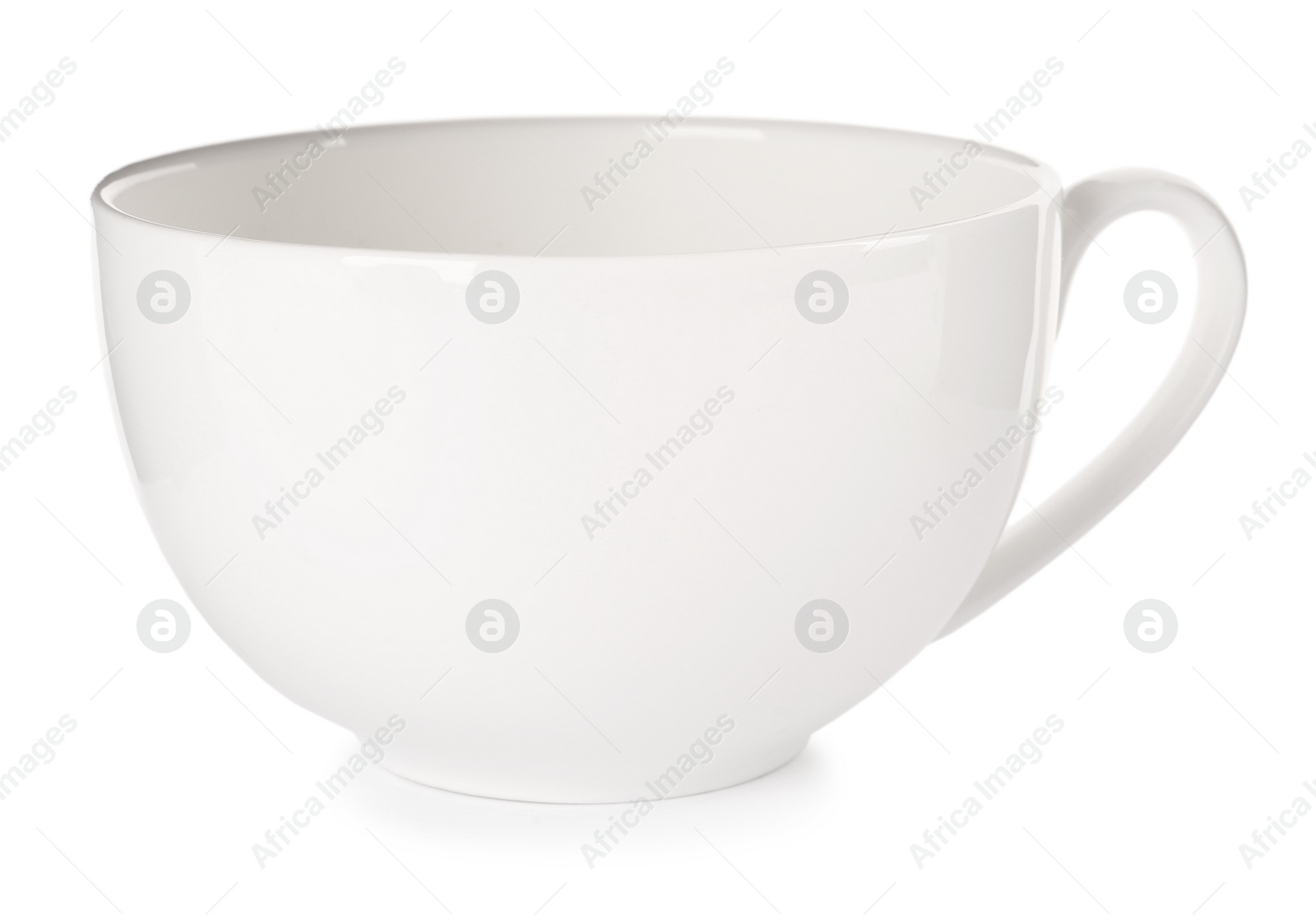 Photo of Beautiful empty ceramic cup isolated on white