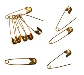 Image of Set with safety pins on white background