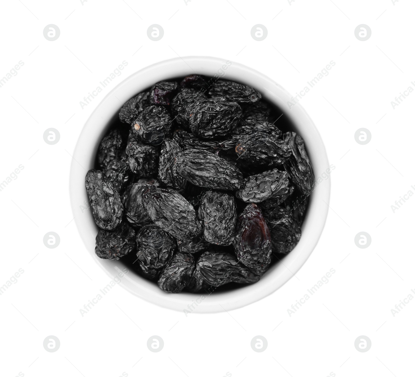 Photo of Bowl with raisins on white background, top view. Healthy dried fruit