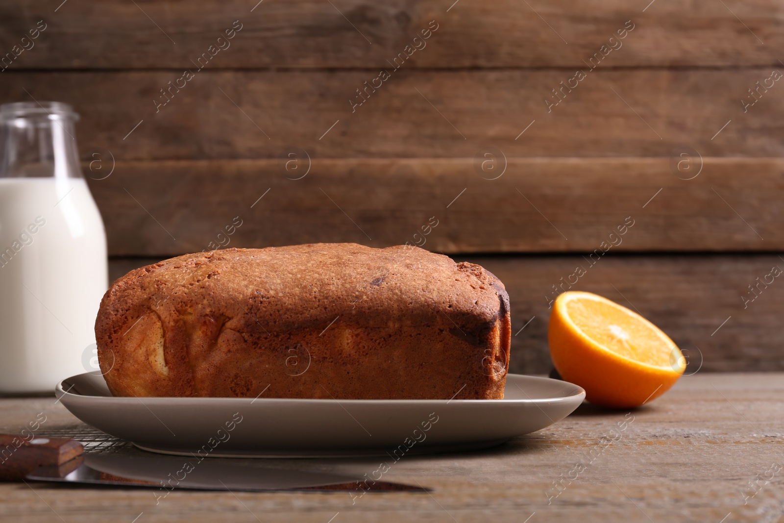 Photo of Fresh delicious cake served on wooden table