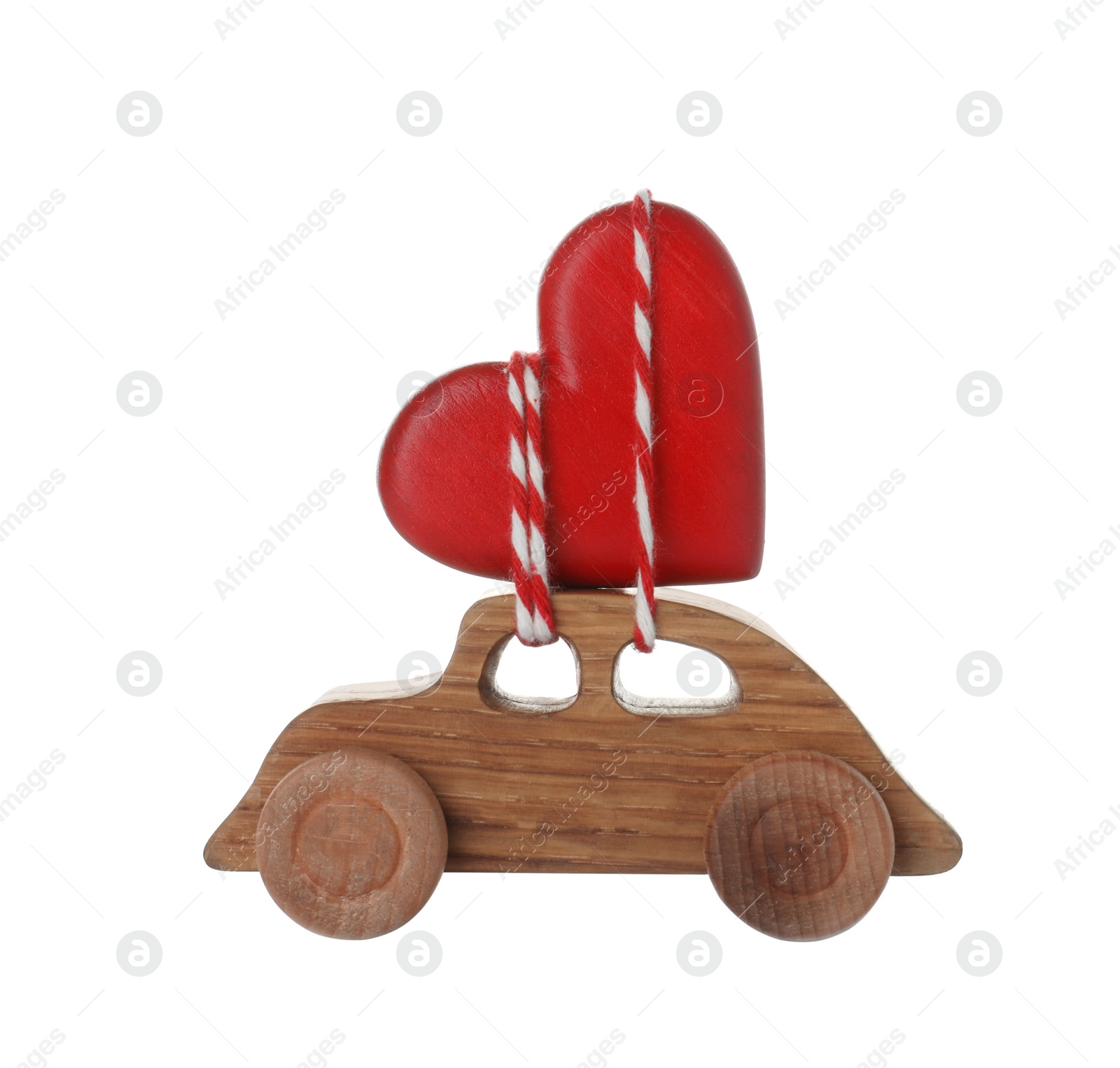 Photo of Toy car with red heart on white background