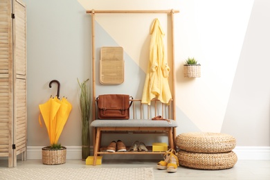 Photo of Cozy hallway interior with storage bench and stylish design elements