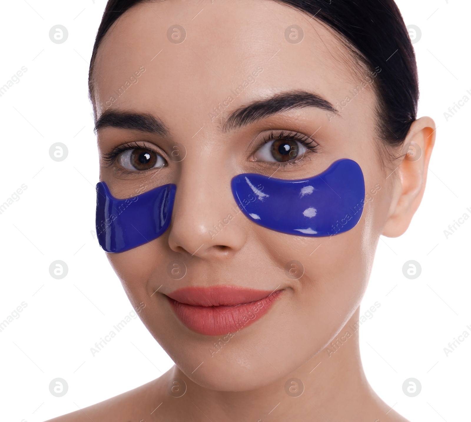 Photo of Beautiful young woman with under eye patches on white background