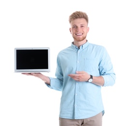 Young man with laptop on white background. Space for text