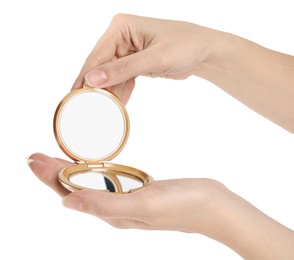 Woman holding stylish cosmetic pocket mirror on white background, closeup