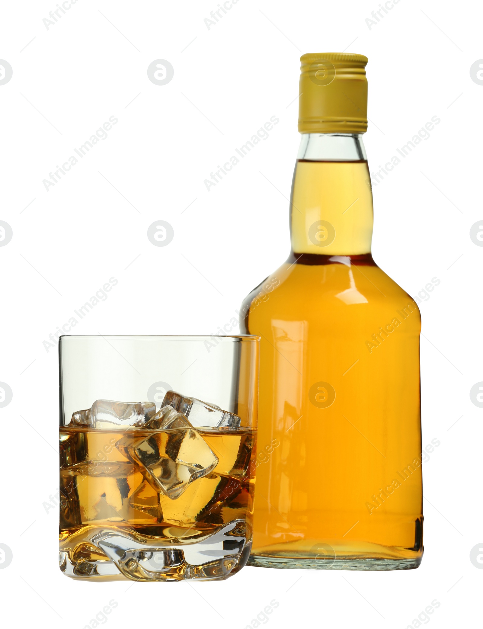 Photo of Whiskey in glass and bottle isolated on white