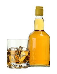 Photo of Whiskey in glass and bottle isolated on white