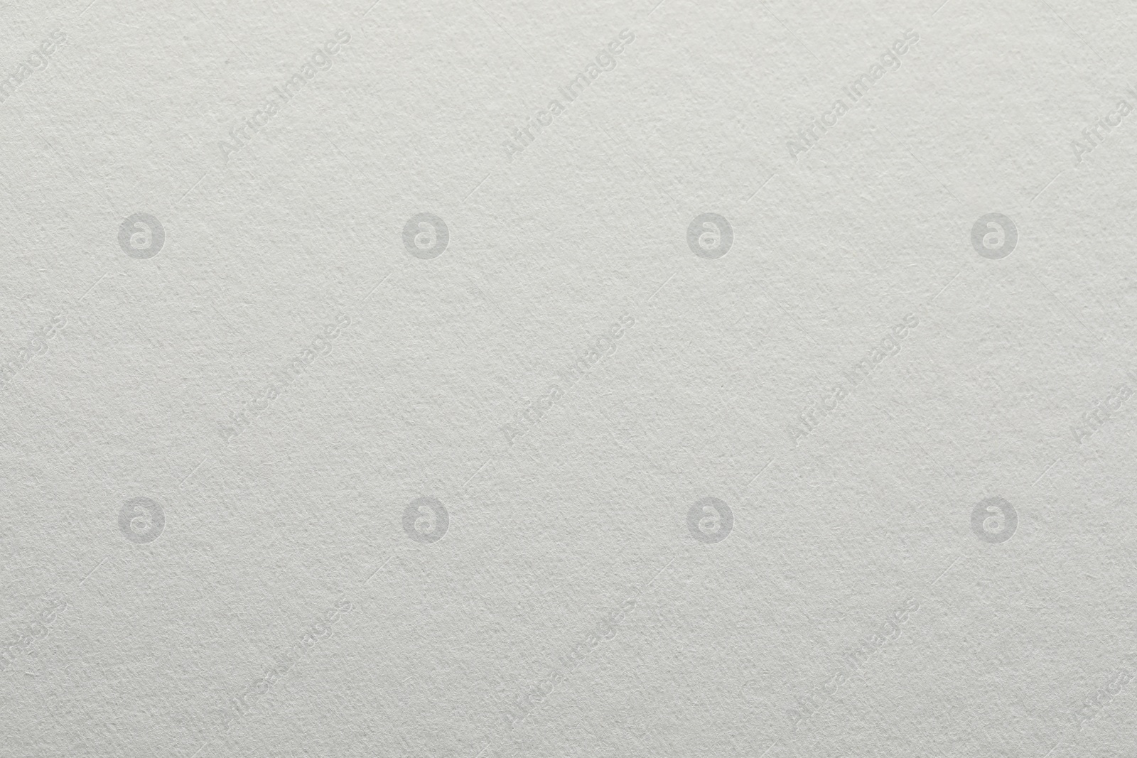 Photo of Texture of white paper sheet as background, closeup