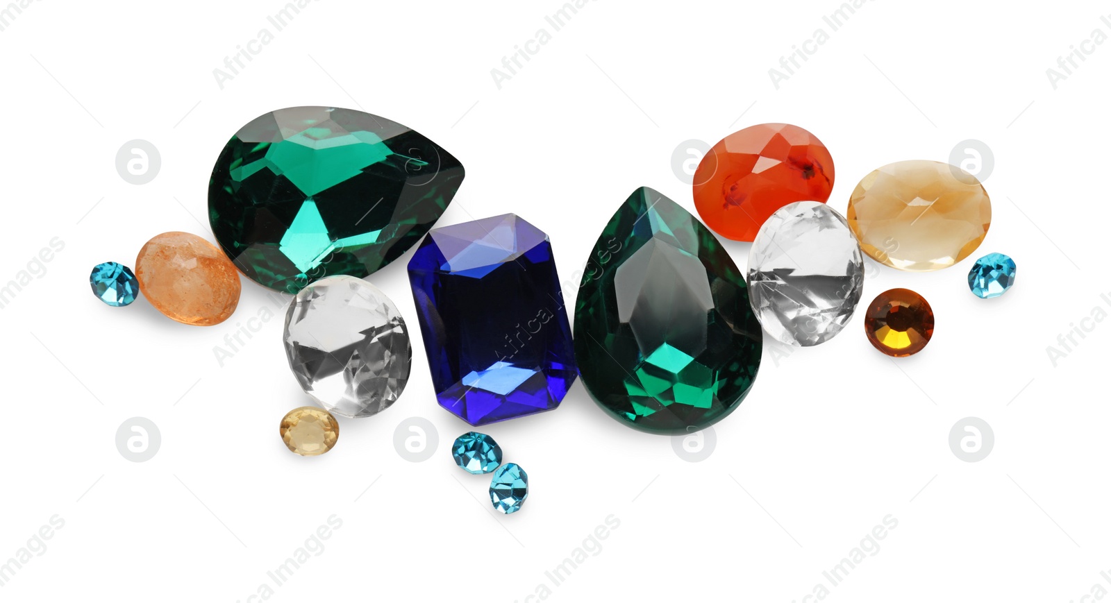 Photo of Different beautiful gemstones for jewelry isolated on white, top view