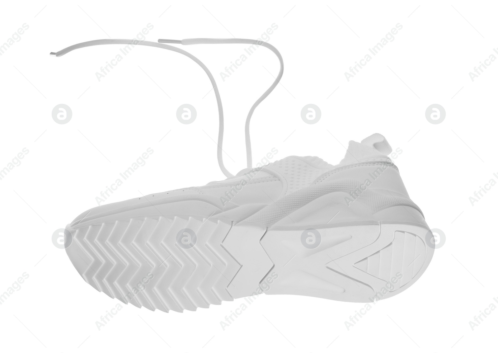 Photo of One stylish new sneaker isolated on white