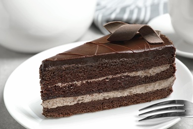 Delicious fresh chocolate cake served on table, closeup