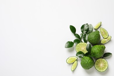 Flat lay composition with ripe bergamot fruits on white background. Space for text