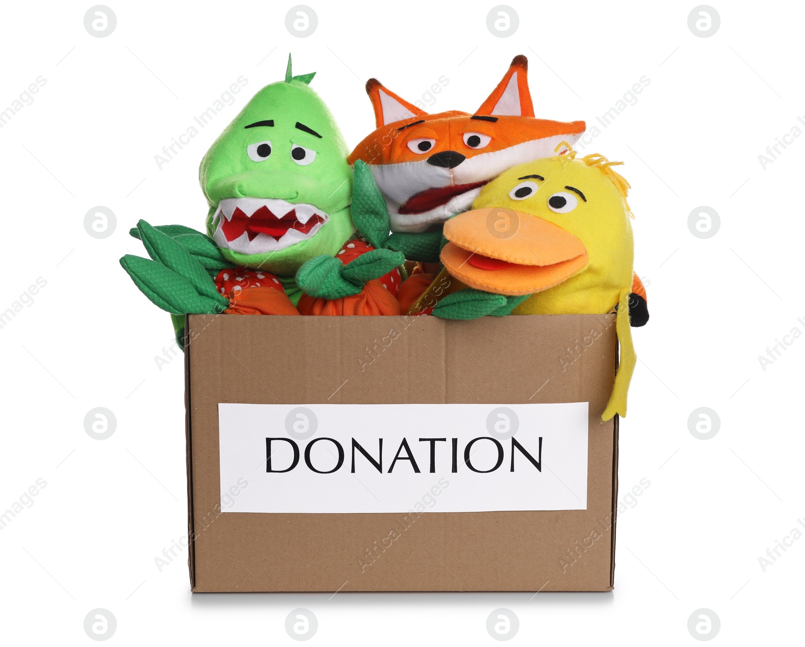 Photo of Donation box full of different toys isolated on white