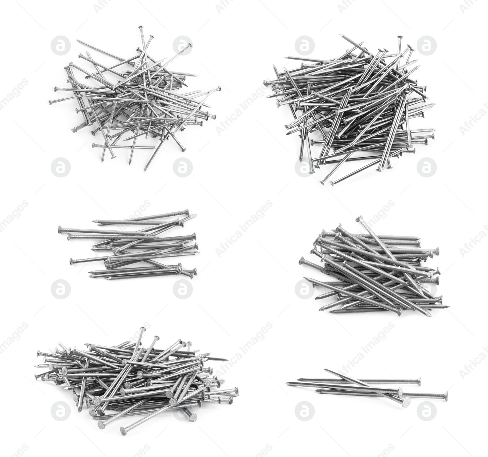 Image of Set with sharp metal nails on white background 