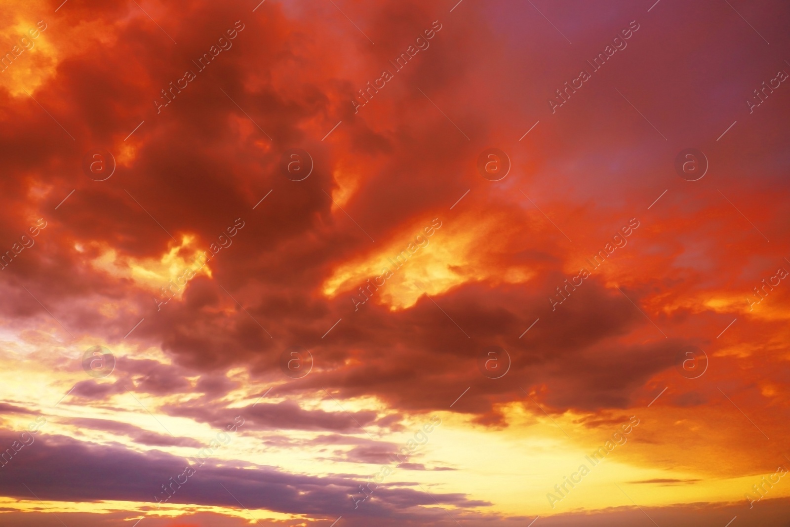 Image of Beautiful view of orange sky with clouds at sunset