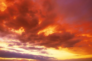 Image of Beautiful view of orange sky with clouds at sunset