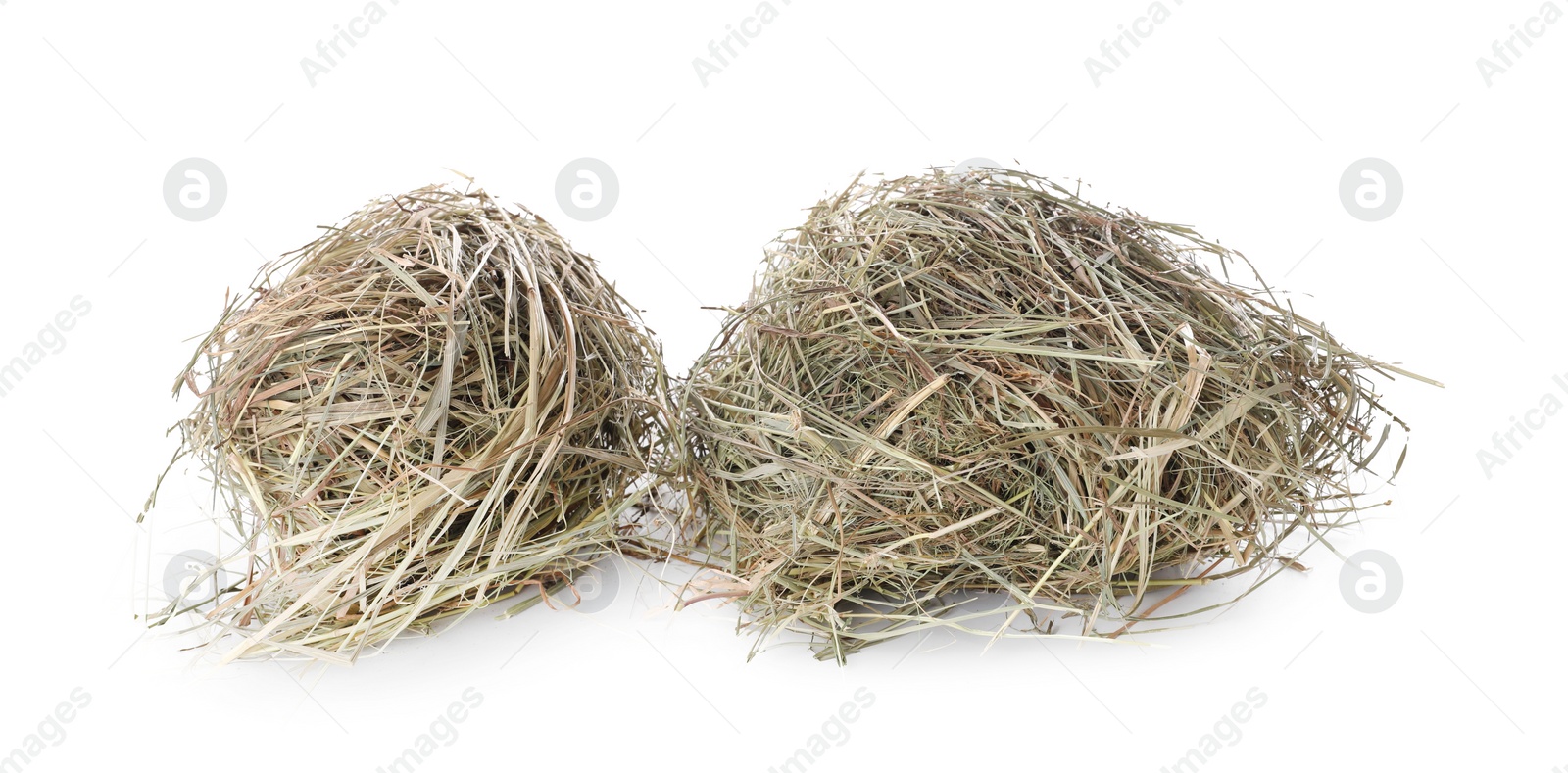 Photo of Dried hay isolated on white. Livestock feed