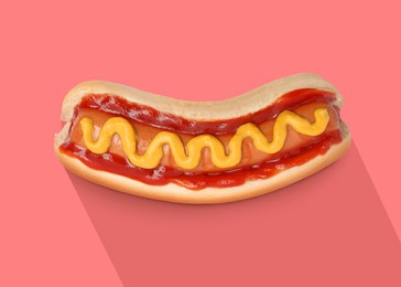 Yummy hot dog with ketchup and mustard on pink background