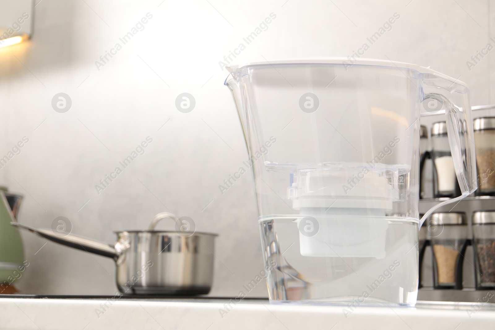 Photo of Water filter jug on countertop in kitchen