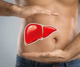 Man and illustration of liver on light grey background, closeup