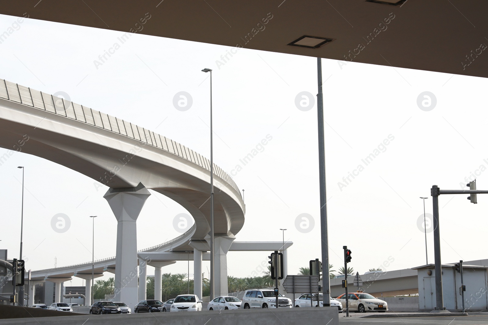 Photo of DUBAI, UNITED ARAB EMIRATES - NOVEMBER 06, 2018: Cityscape with flyover and busy traffic