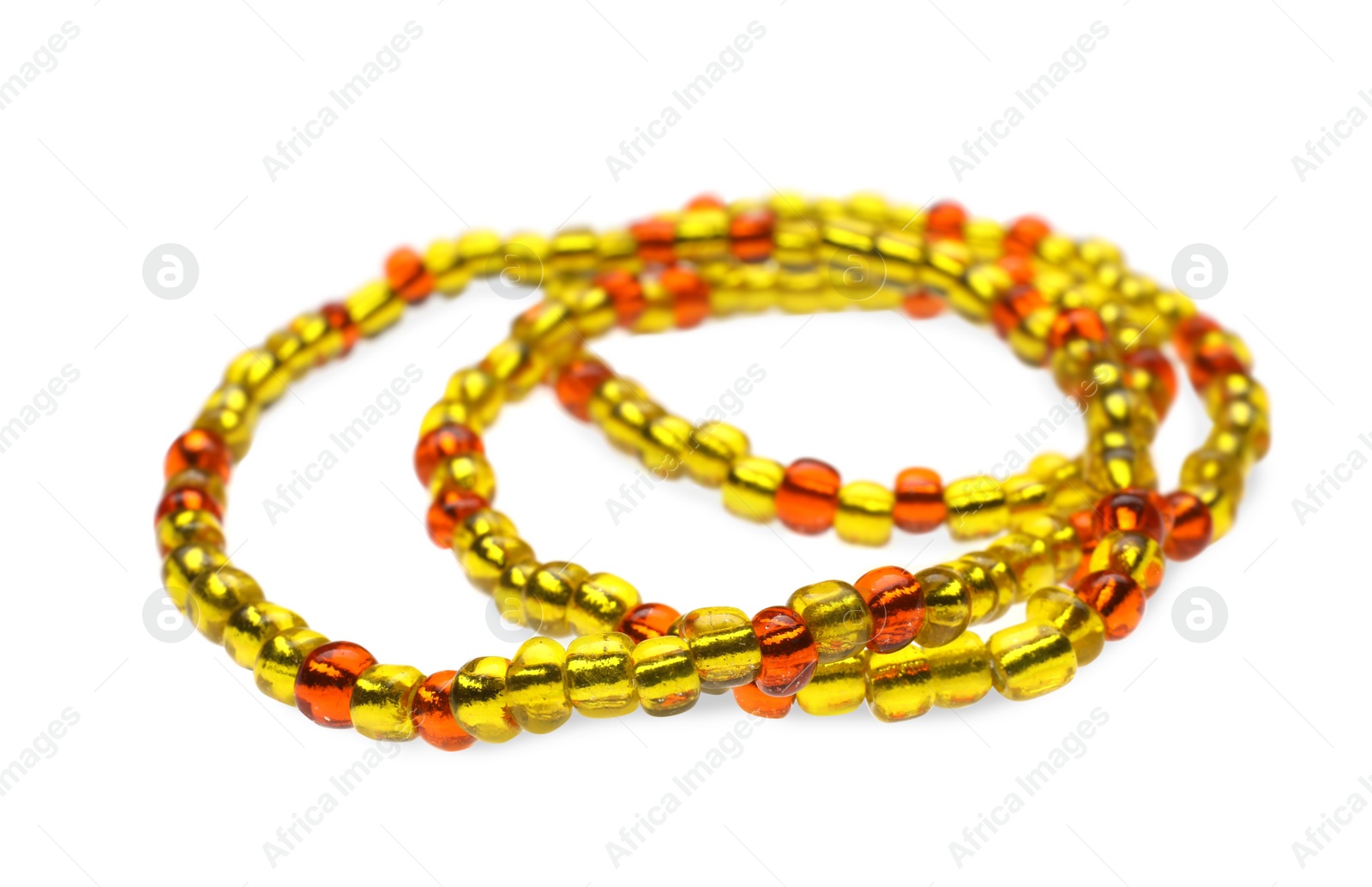 Photo of Beautiful handmade beaded jewelry on white background, closeup