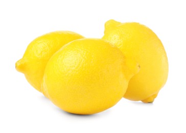 Photo of Three fresh ripe lemons isolated on white