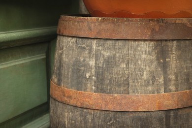 Traditional wooden barrel outdoors, closeup. Wine making