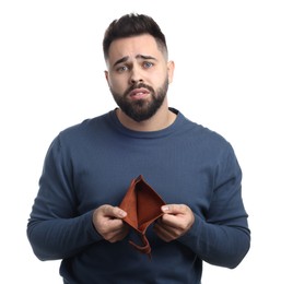 Photo of Upset man showing empty wallet on white background