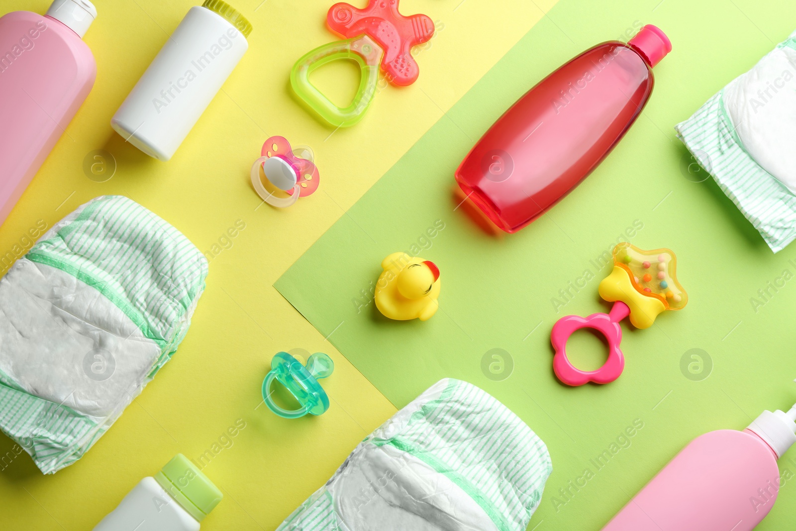 Photo of Flat lay composition with baby accessories on color background