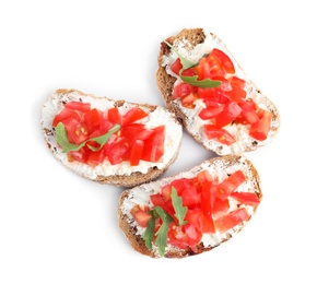 Delicious tomato bruschettas on white background, top view